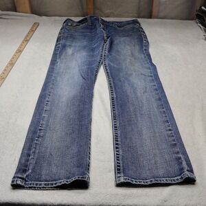 Ariat Men's Straight Jeans in Medium Blue Wash 
With rip in the back